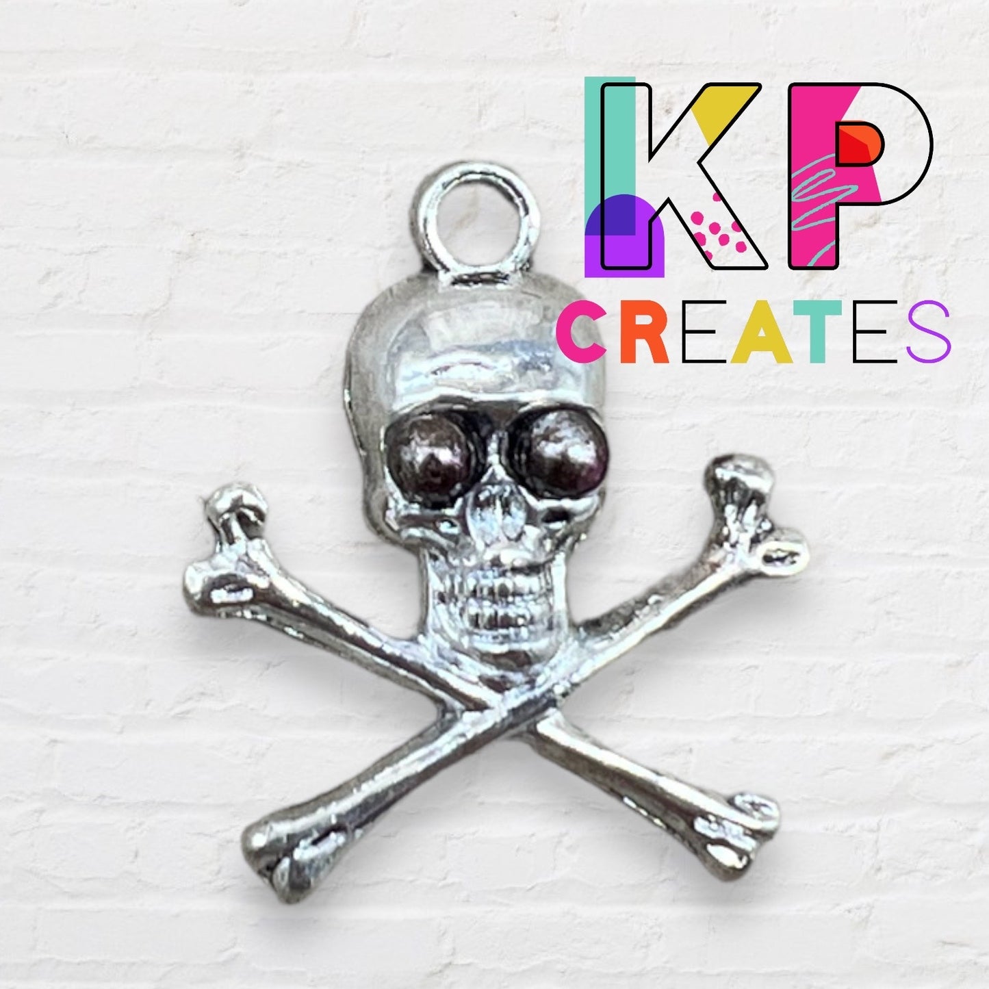 Crossbones Skull Charm