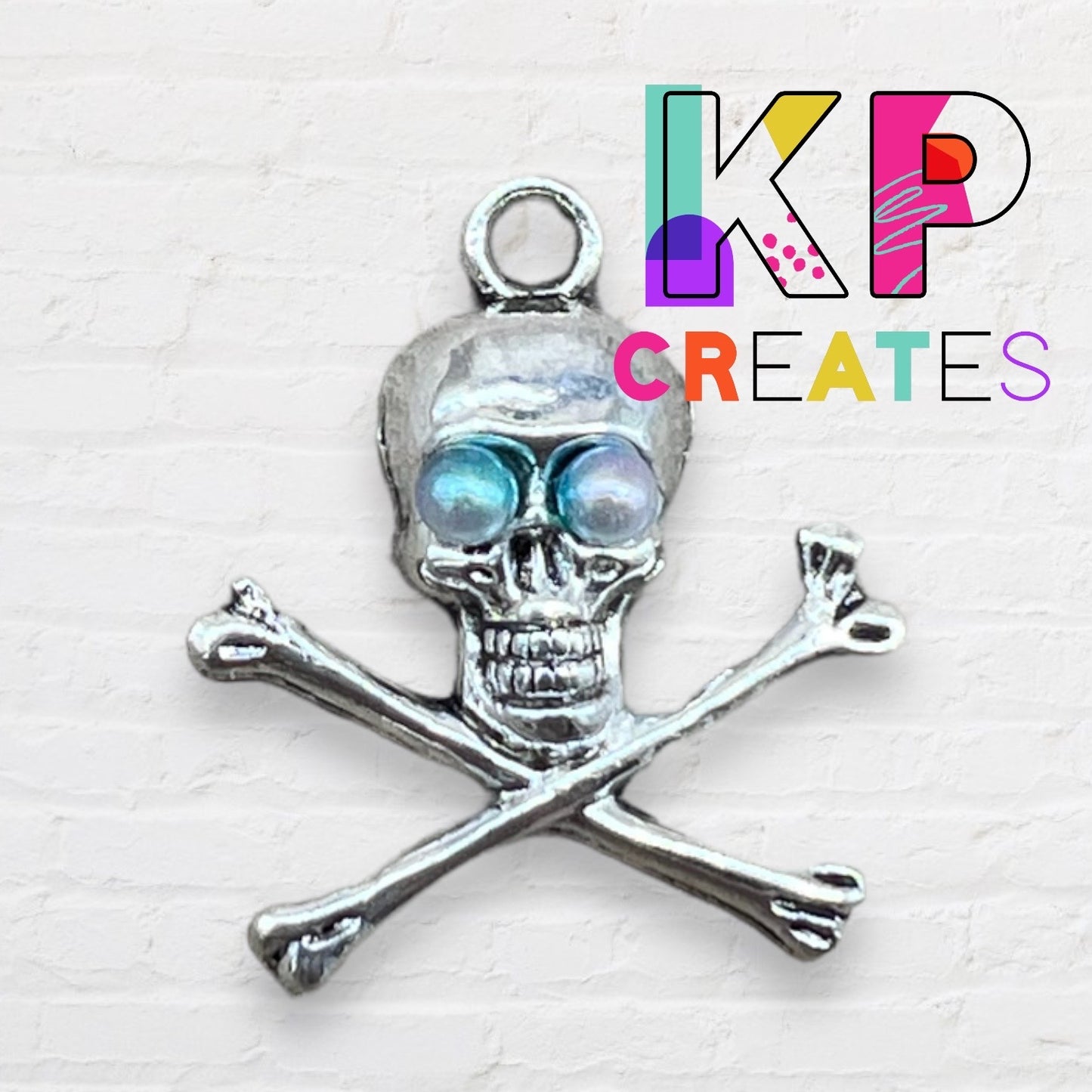 Crossbones Skull Charm