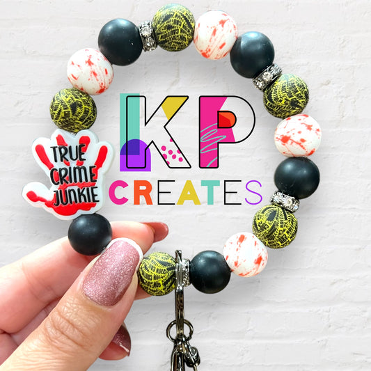 True Crime Junkie Silicone Bead Wristlet Keychain